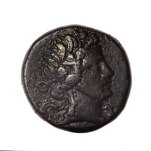 bronze coin, Pantikapaion; obverse: head of young Dionysus in an ivy wreath facing right; reverse: