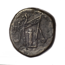 Bronze coin, Pantikapaion; obv.: head of young Dionysus in an ivy wreath facing right; rv.: bow and