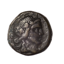 Bronze coin, Pantikapaion; obv.: head of young Dionysus in an ivy wreath facing right; rv.: bow and
