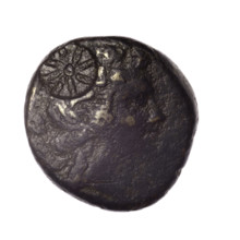 bronze coin, Pantikapaion; obv.: head of young Dionysus in ivy wreath facing right, countermark