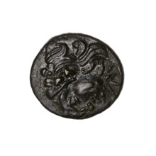 Bronze coin, Pantikapaion; obverse: head of a bearded Satyr in an ivy wreath to the left, pierced