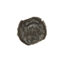 Bronze coin, Pantikapaion; obverse: bearded Satyr's head to the right, countermark (tripod and
