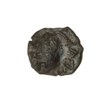Bronze coin, Pantikapaion; obverse: bearded Satyr's head to the right, countermark (tripod and