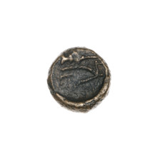 Bronze coin from Pantikapaion depicting a bull's head (three-quarters to the right) and, on the