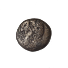 Bronze coin from Pantikapaion; obverse: head of bearded Satyr in ivy wreath facing left; reverse: