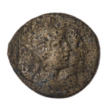 bronze coin, Pantikapaion; aw: head of Attys in a Phrygian cap decorated with stars and in a laurel