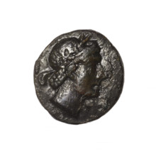 bronze coin, Pantikapaion; obverse: head of Apollo in laurel wreath facing right; reverse: quiver