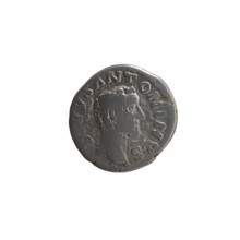 Denarius, after 161 CE. Obverse: Head of Antoninus Pius without a covering facing right,