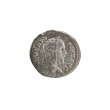 Denarius, silver coin (210 CE). Obverse: Head of Septimius Severus (Roman emperor, 146–211) in a
