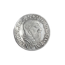 Male bust in armour turned right, with a beard and sideburns; rim with a pearl border and