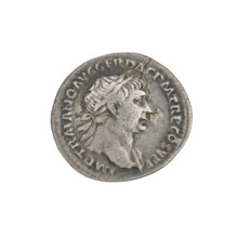 Denarius of Trajan (53–117; Roman Emperor 98–117). Obverse: bust of Trajan facing right, wearing a