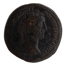 Sestertius of Antoninus Pius (86–161; Roman emperor 138–161). Obverse: Head of Antoninus Pius in a