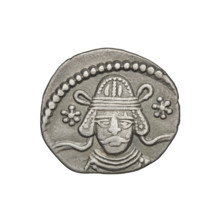 Drachma of Vardanes II (55–58 CE). Obverse: frontal head of Vardanes II with two stars at the