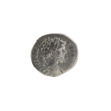 Denarius depicting Mars and Septimius Severus. Obverse: Head of Septimius Severus with laurel