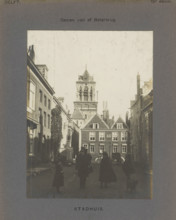 View of the town hall in Delft, seen from the Boterbrug with people, a coach and a dog, Town Hall.