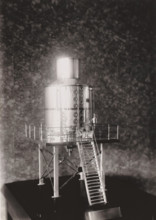 Scale model of a cooking pot, photograph, without the glass cover of the display cabinet. Part of