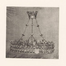 Wrought-iron chandelier from St. Peter's Church in Bastogne, displayed at an exhibition on