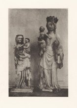 Sculpture of alabaster and a sculpture of marble of Mary with child, displayed at an exhibition of