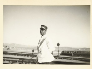 Portrait of an American man, probably working on a train, Unknown location in the United States: