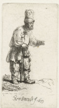 A peasant in a high cap, standing leaning on a stick, print, inscription: 'Coppier', signature and