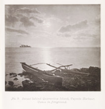 Sunset behind Quarantine Island, Papeete Harbour. Canoe in foreground, Sunset over the Pacific