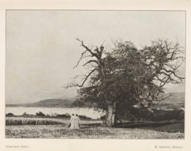 Two women in a meadow, with hills and a lake in the background, page, photomechanical print,