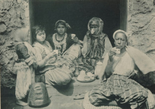 Four women drinking coffee in the Tunisian part of the Antwerp World Exhibition in 1894, Tunisia,