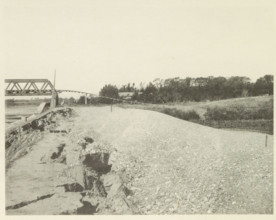 View of a collapsed railway bridge over the Nagara River in Japan after an earthquake, page,