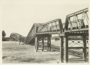 Collapsed railway bridge over the Nagara River in Japan after an earthquake, page, photomechanical