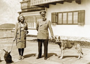 Eva Braun Photo Album Eva Anna Paula Braun (1912 - 1945) and Adolf Hitler (1889 - 1945) with their dogs. Negus and Katus