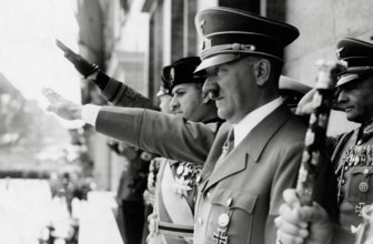 Adolf Hitler and Count Ciano (Son in law of Benito Mussolini) giving salute from Chancellory balcony circa 1939 PUBLICA