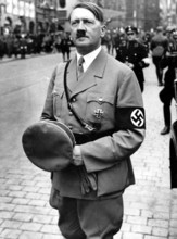 Adolf Hitler (1889-1945) at the Reich s Party Day at Nurenberg. In the background are two of his SS bodyguards 1934. Mo