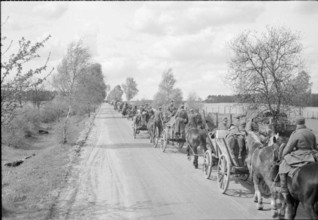 Germany Under Allied Occupation German troops using horse-drawn transport make their way towards the British forces in H