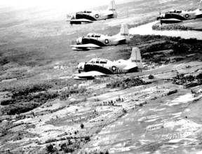 Vietnam: A-1E Skyraider aircraft of the 34th Tactical Group, based at Bien Hoa, South Vietnam, fly in formation over Sou