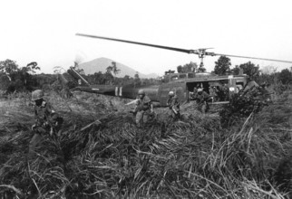 RECORD DATE NOT STATED Vietnam: US infantry attacking from a Huey UH-1D helicopter, Central Highlands, 1966 The Second I