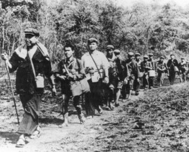 Cambodia: Khmer Rouge Leadership: Pol Pot, Nuon Chea and Ieng Sary in a 1979 DK propaganda photograph. In a staged photo