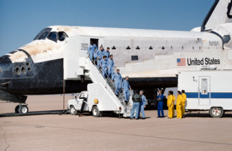 61A-S-140 (6 Nov 1985) --- The record-setting eight crewmembers for STS 61-A file from their home for the past week at t
