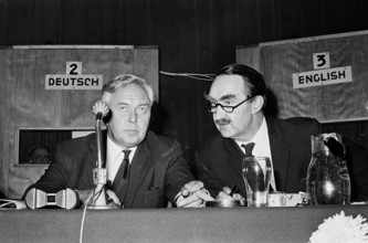 Anefo photo collection. The Congress of the Sai in Amsterdam. On the left the Secretary Albert Carthy with Harold Wilson