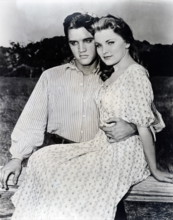 Photograph of Elvis and Priscilla Presley while on the set of Love me Tender . Elvis Presley (1935-1977) an American sin