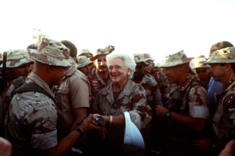 RECORD DATE NOT STATED First Lady Barbara Bush greets a Marine as she works her way through the crowd during a Thanksgiv