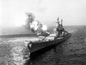 Korea: The USS Missouri fires a 16-inch salvo at Chong Jin, North Korea. Korean War (1950-1953). The Korean War (25 June