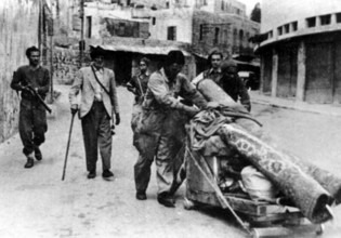 Israel / Palestine: Palestinians expelled from their homes in Haifa by Israeli forces, 1948 The 1948 Palestinian exodus,