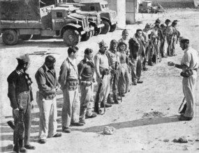 Israel / Palestine: Soldiers of the Israeli Palmach (Negev Brigade) receive orders before participating in Operation Yoa