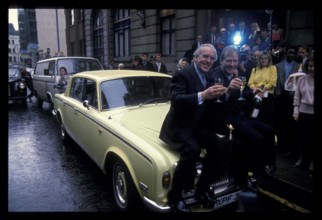 RECORD DATE NOT STATED  GEORGE COLE & DENNIS WATERMAN Ref:026 car, drinks, fans London Great Britain Copyright: xPhilxLo