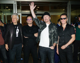 MUMBAI, INDIA - DECEMBER 12: Lead vocalist Bono, lead guitarist and keyboard player The Edge, bass guitarist Adam Clayt