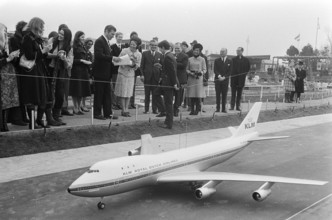 Anefo photo collection. Princess Beatrix present at the opening of Madurodam in The Hague. Princess Beatrix looks at a m