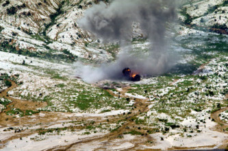 RECORD DATE NOT STATED Smoke and dust rise into the air as several bombs dropped by a Navy aircraft explode in the impac
