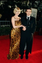 Melanie Griffith and Husband Antonio Banderas at the 1997 Golden Globe Awards Los Angeles CA USA PUB