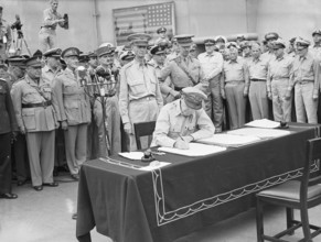 Japanese Surrender at Tokyo Bay, 2 September 1945 General of the Army, Douglas MacArthur signs the surrender as Supreme