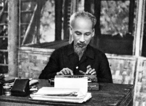 Vietnam: President Ho Chi Minh (1890-1969) seated at his typewriter, c. 1950 Há» Chi Minh, born Nguyá»Ön Sinh Cung and a